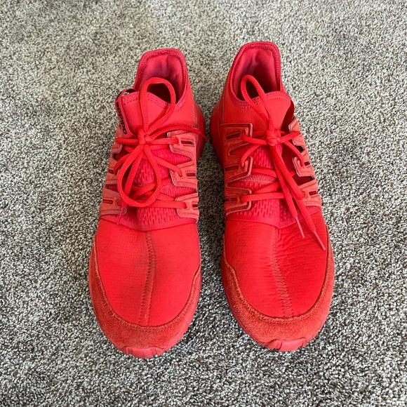 Adidas Red Athletic Shoes with Streamlined Silhouette and Flexible Design - Picture 2 of 6